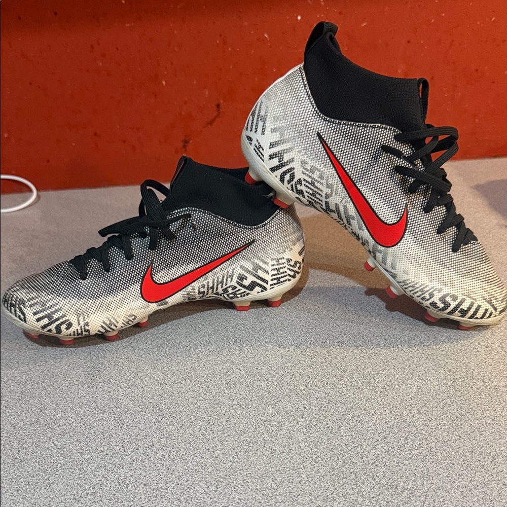 Nike Mercurial  Neymar firm ground soccer cleats - Black, White, and Red Design